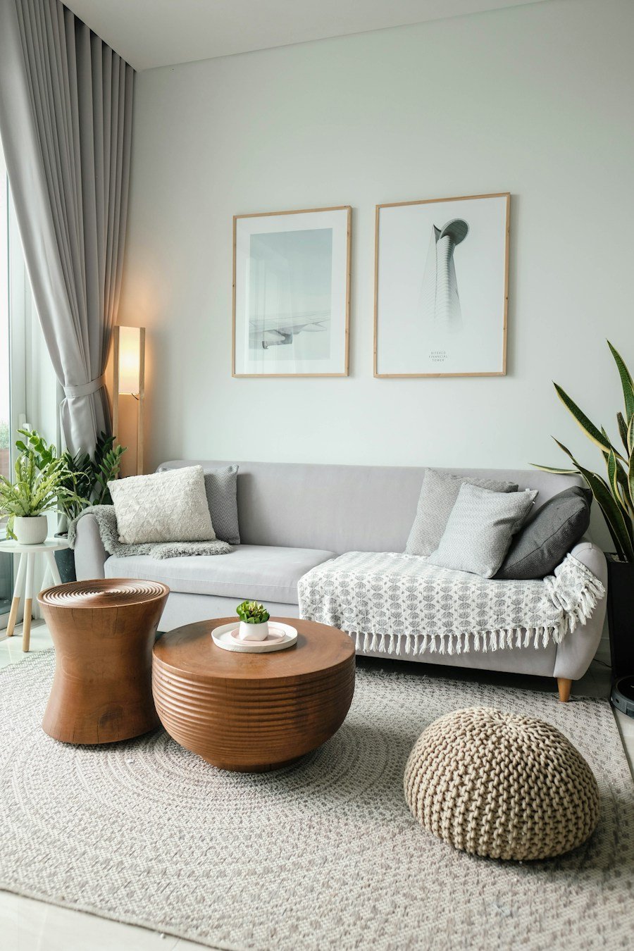 Inviting neutral living room with natural wood and green plants